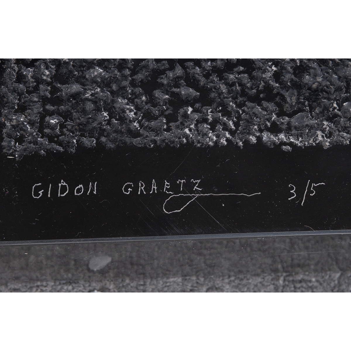 Artwork by Gidon Graetz, Abstract Couple Seated, Made of black marble sculpture