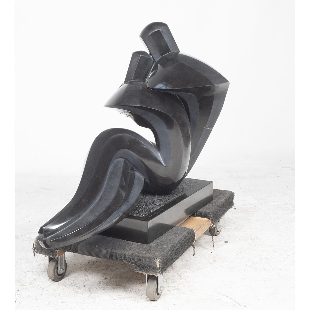 Artwork by Gidon Graetz, Abstract Couple Seated, Made of black marble sculpture