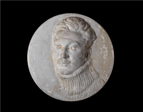 Tondo represent male face. by Angelo Zanelli