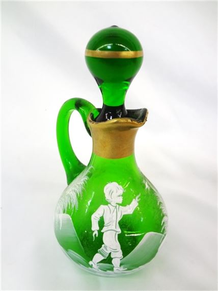 Antique Mary Gregory Glass Green Cruet With Stopper: Measuring 6.5" tall boy with bird detail. No condition issues.