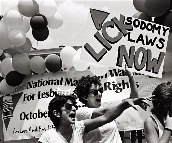 Urvashi Vaid and Sue Hyde of the National Gay and Lesbian Task Force at DC's Gay and Lesbian Pride Parade. by Joan E. Biren, 1982; printed 1997
