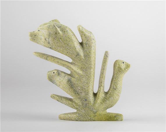 green stone carving of a Spirit by Tukiki Manomie