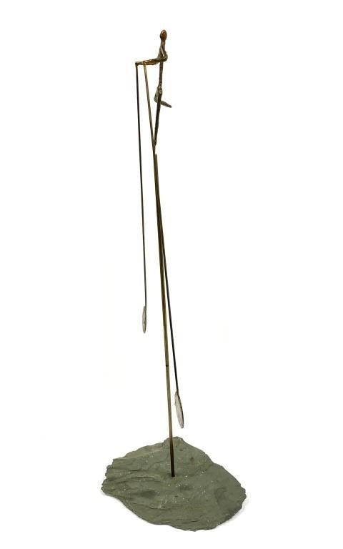 Artwork by Gordon Brott, American Balancing Man, Made of metal