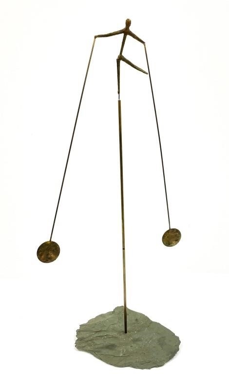 Artwork by Gordon Brott, American Balancing Man, Made of metal