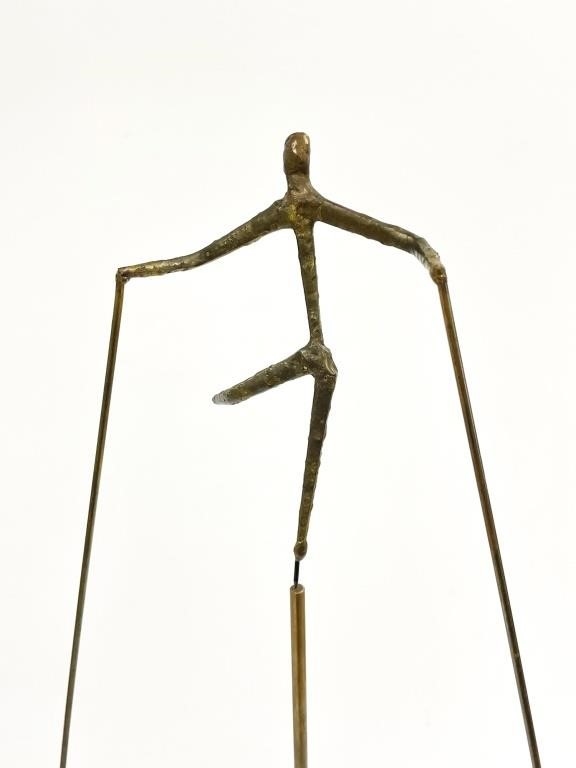 Artwork by Gordon Brott, American Balancing Man, Made of metal