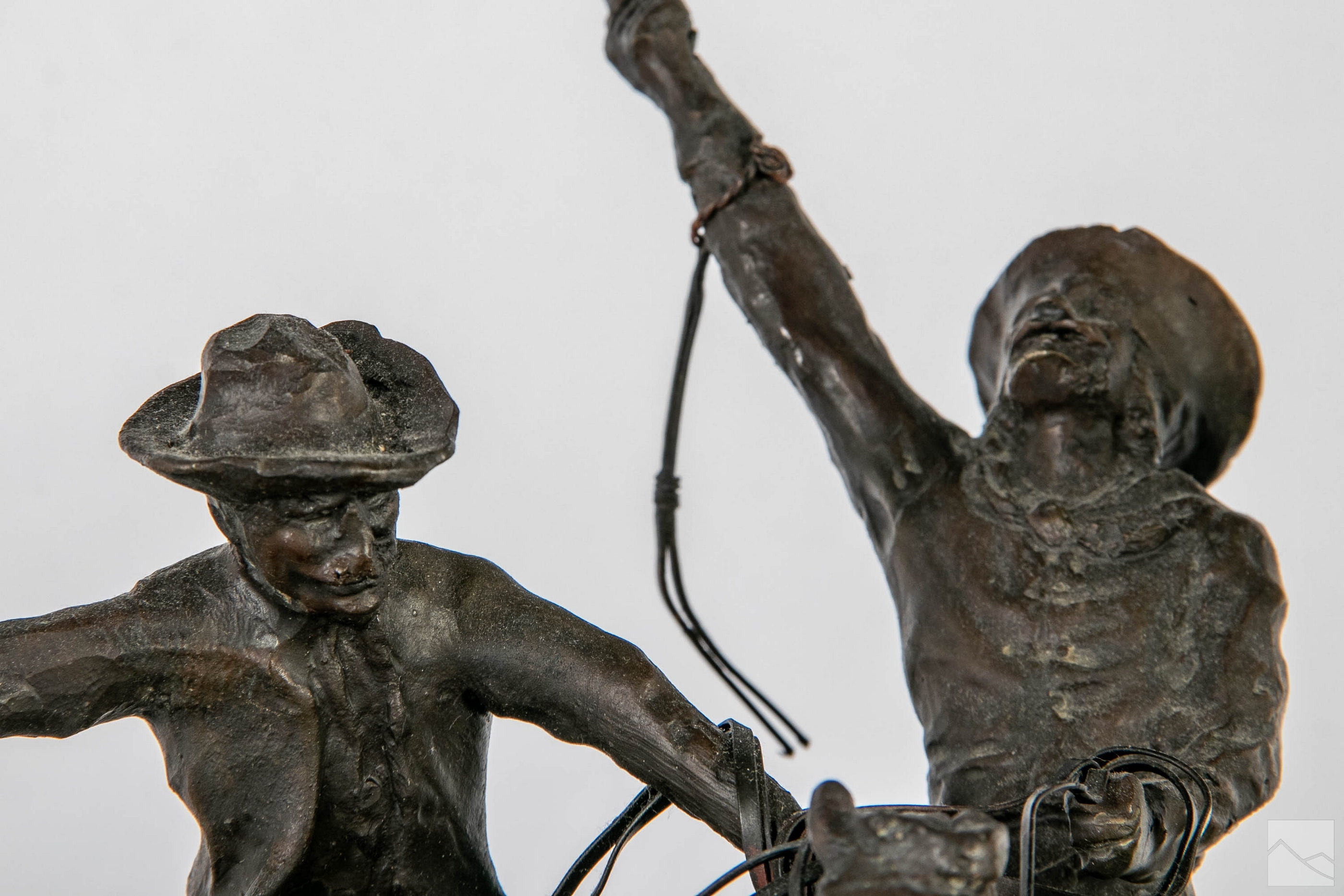 Frederic Remington | Depicting four cowboy riders on horseback | MutualArt