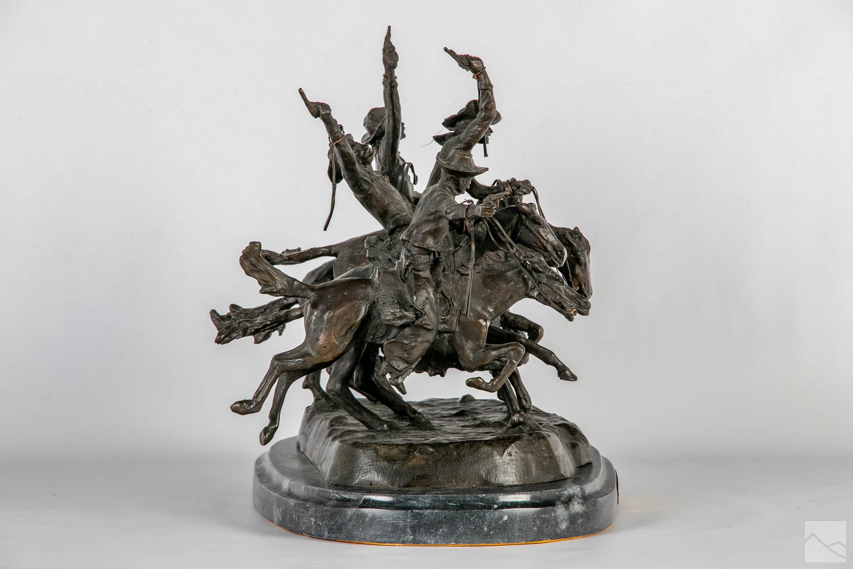 Frederic Remington | Depicting four cowboy riders on horseback | MutualArt