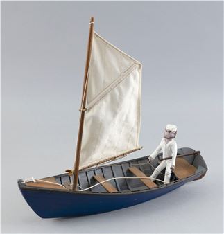 IRVING BRIGGS FOLK ART MODEL OF A SAILOR IN HIS BOAT - Irving Briggs