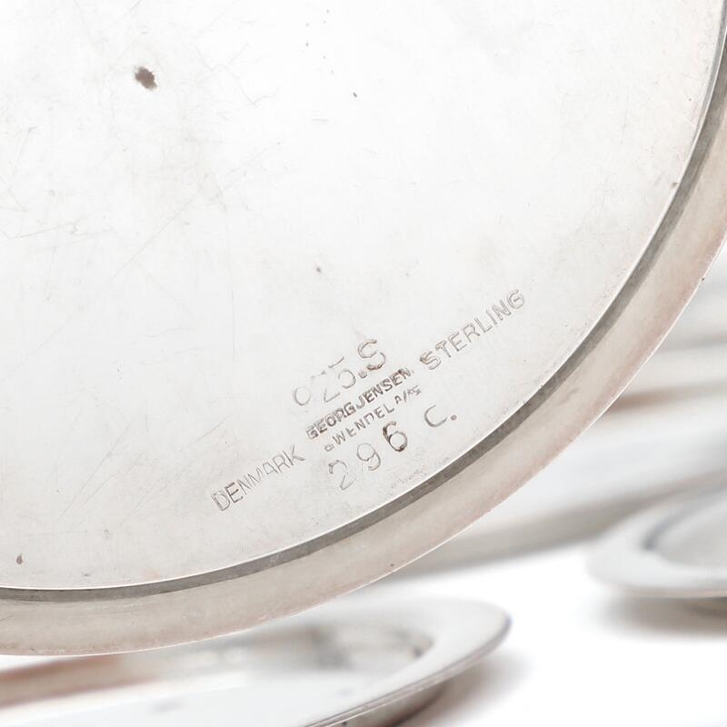 Jensen A set of 12 sterling silver glass coasters (1945