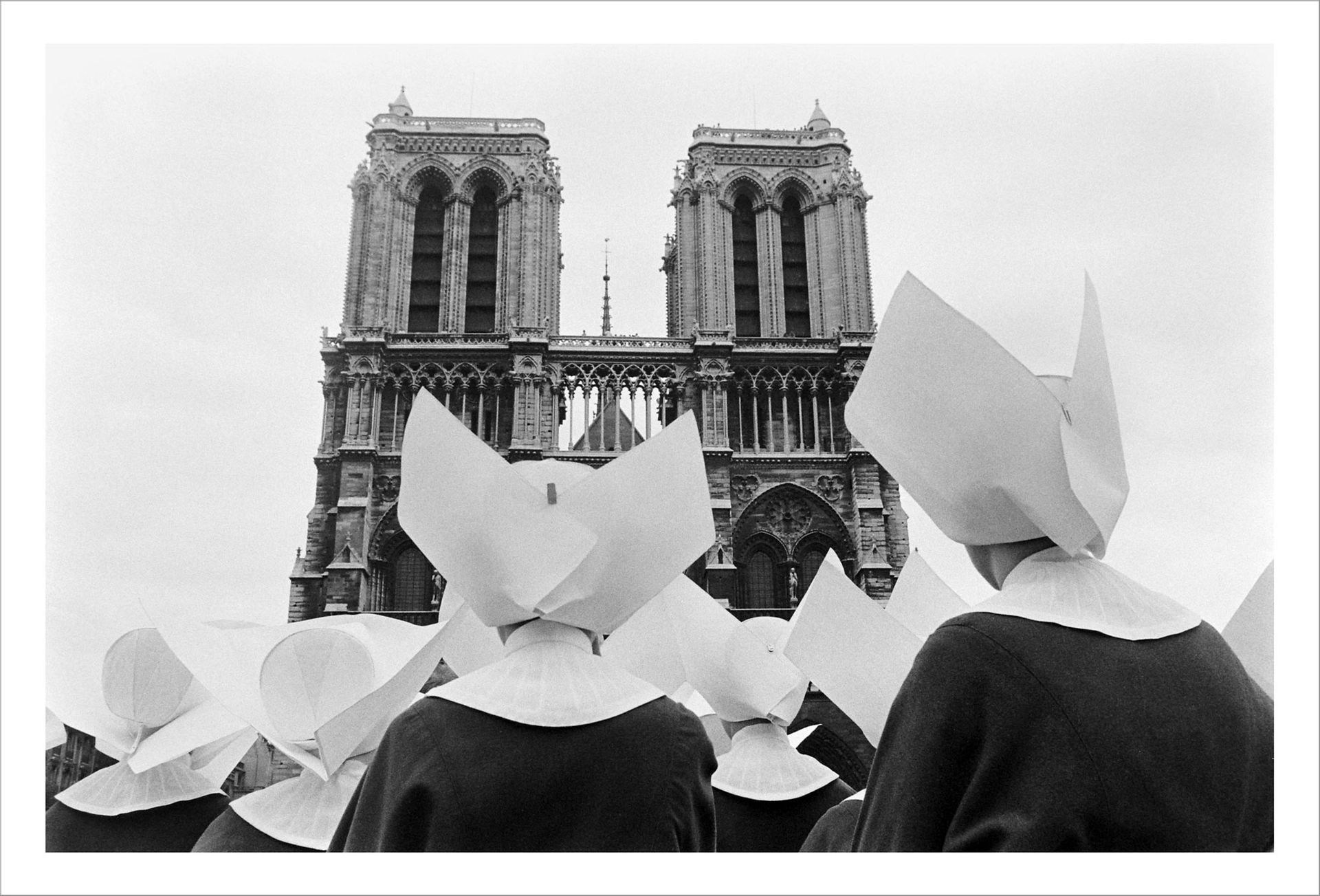 Walter Sanders A group of Catholic Sisters contemplate the Notre Dame Cathedral in Paris (1959