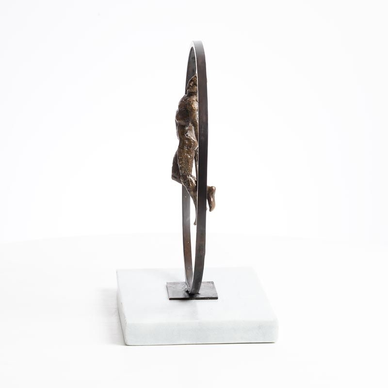 Artwork by Mark Rode, Peace, Made of bronze on a marble base