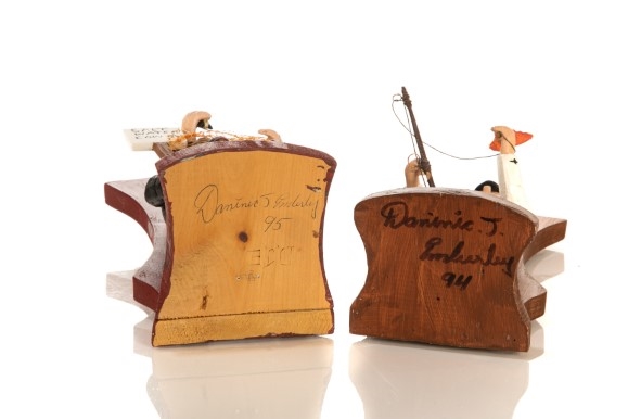 Artwork by Dominic J. Emberley, Two Nova Scotian Fisherman wall fixtures, Made of wood