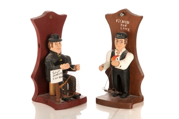 Artwork by Dominic J. Emberley, Two Nova Scotian Fisherman wall fixtures, Made of wood