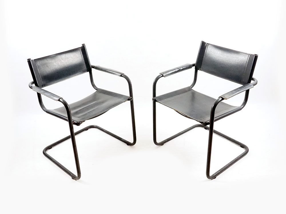 Artwork by Marcel Breuer, Mart Stam, Set of chairs in Bauhaus style, Made of tubular structure in black enamelled steel. The seat, the back and the armrests are in black leather