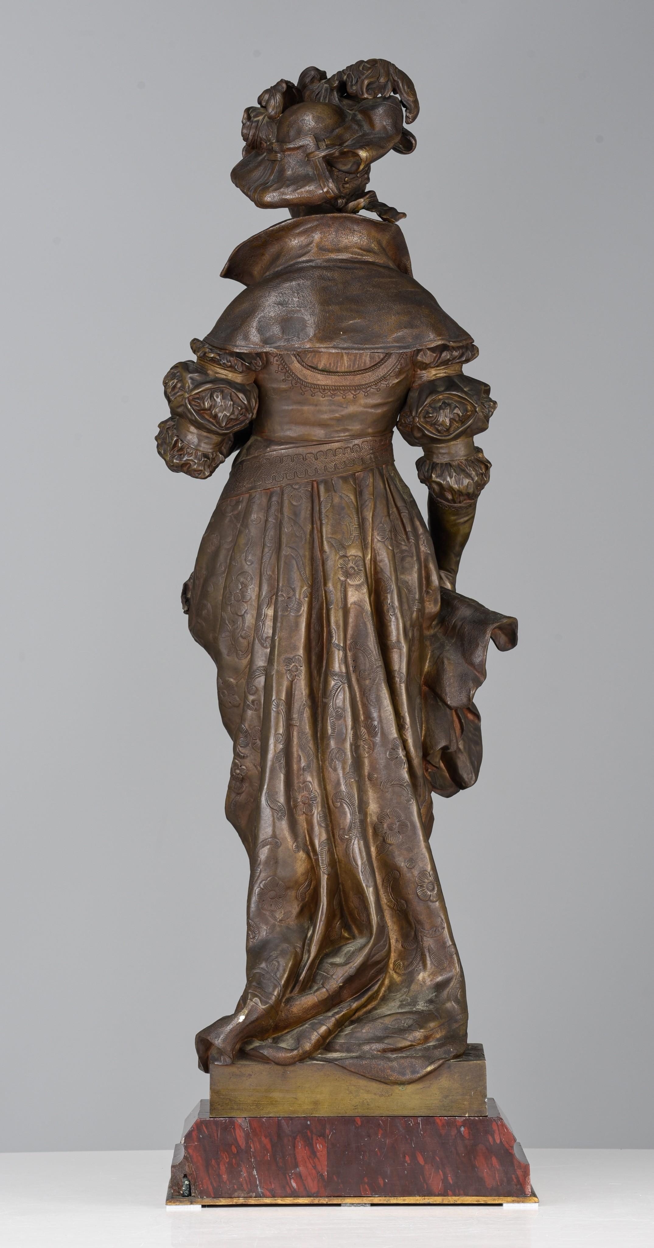 Artwork by Cesar Ceribelli, lady with roses, Made of patinated bronze