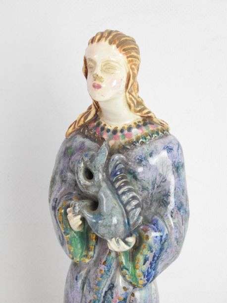 Artwork by Henriette Korner, Subject in polychrome earthenware representing a young girl holding a squirrel, Made of polychrome earthenware