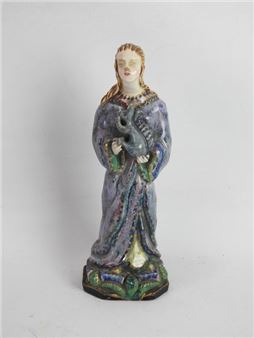 Subject in polychrome earthenware representing a young girl holding a squirrel - Henriette Korner