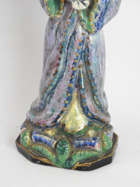 Artwork by Henriette Korner, Subject in polychrome earthenware representing a young girl holding a squirrel, Made of polychrome earthenware