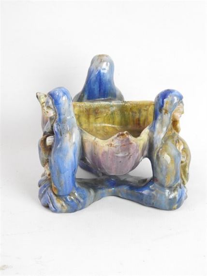 Polychrome earthenware cup of triangular form with decoration of three women in prayer