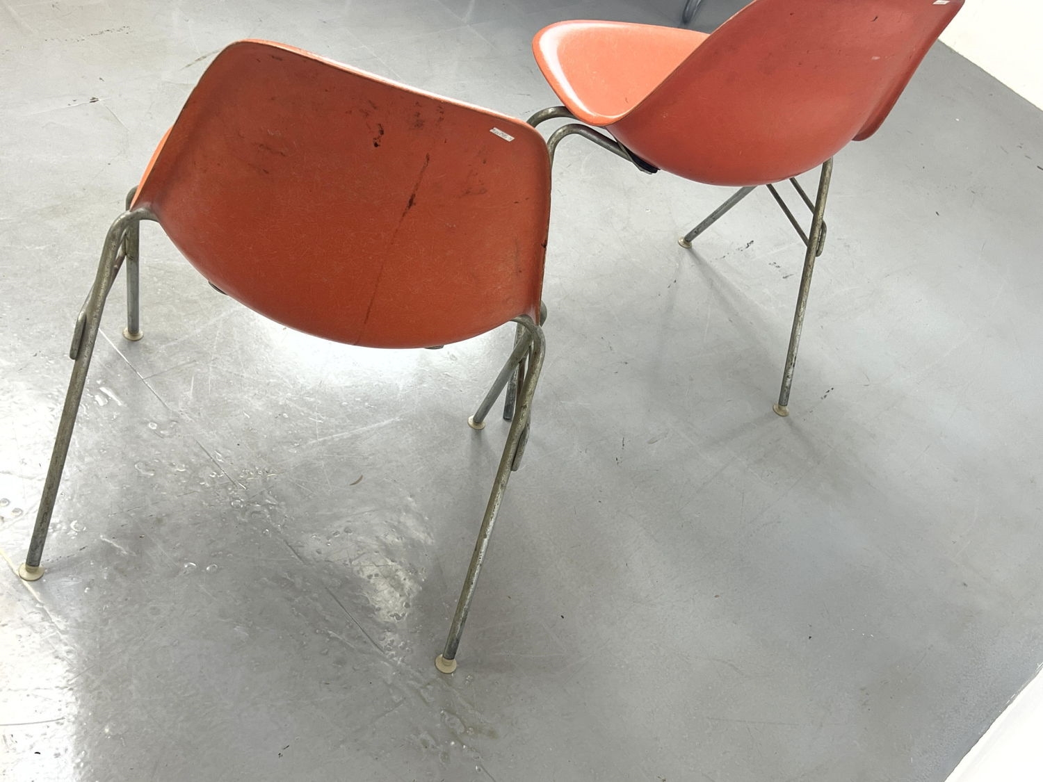 Herman Miller | Pr Orange Eames shell chairs | MutualArt