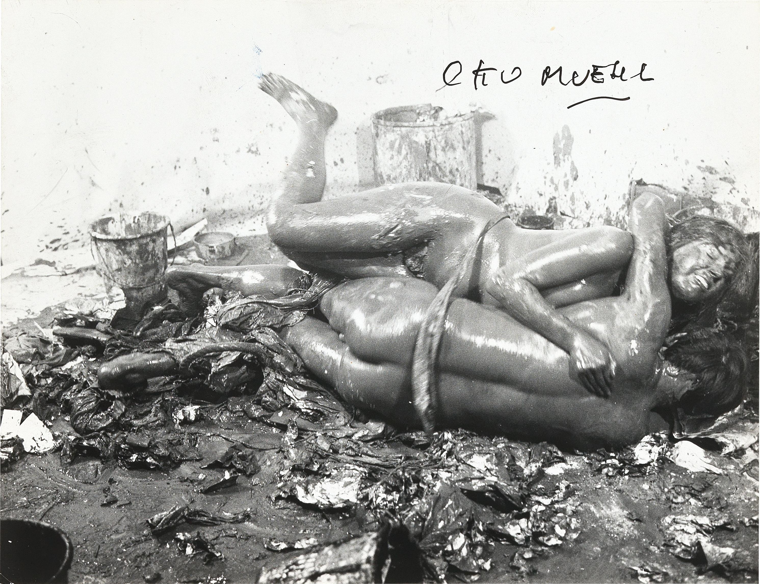 Material Action No. 3: ‘Klarsichtpackung-Versumpfung in einer Truhe-Panierung eines weiblichen Gesäßes-Wälzen im Schlamm’ by Otto Muehl, 1964