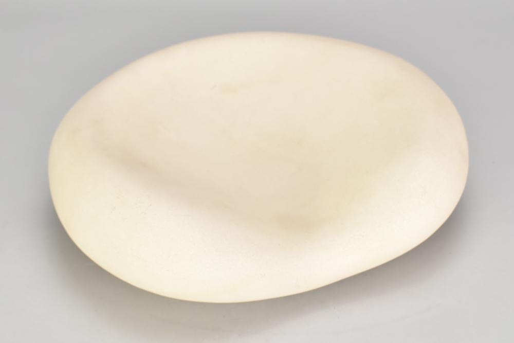 Artwork by Mari-ruth Oda, an earthenware food pillow, Made of earthenware