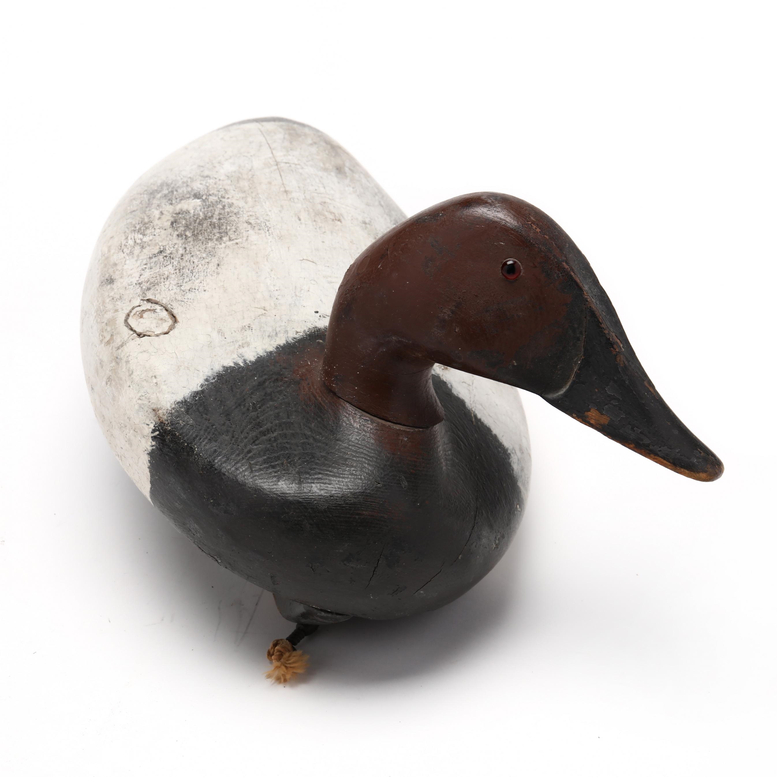Artwork by Danny Scriven, Canvasback, Made of carved and painted wood