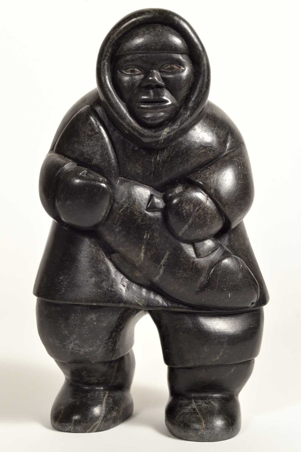 Artwork by Conlucy Nayoumealook, Pècheur avec sa prise, Made of Stone