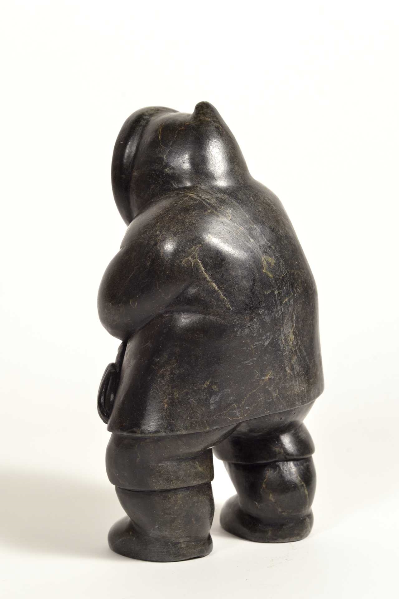 Artwork by Conlucy Nayoumealook, Pècheur avec sa prise, Made of Stone