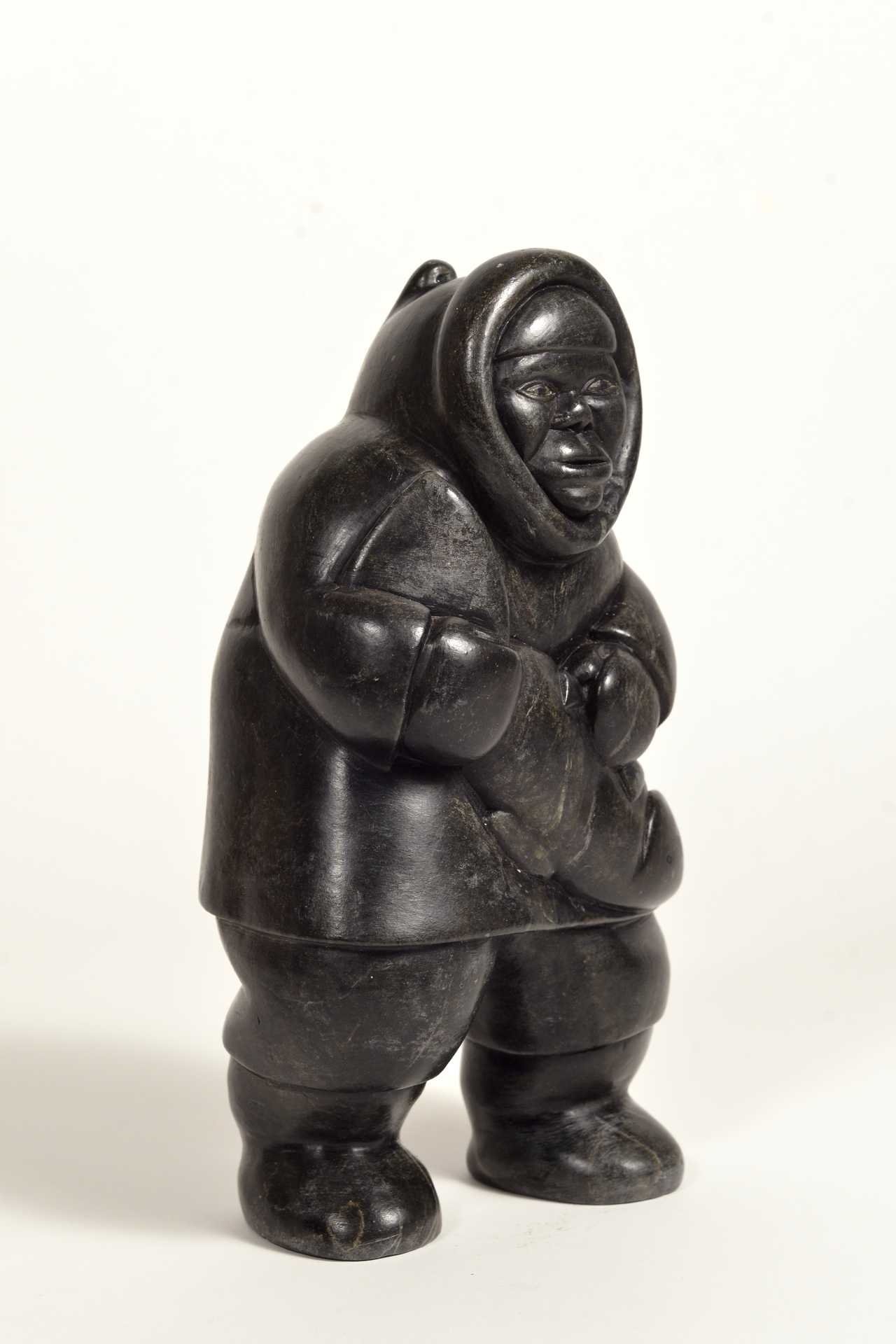 Artwork by Conlucy Nayoumealook, Pècheur avec sa prise, Made of Stone