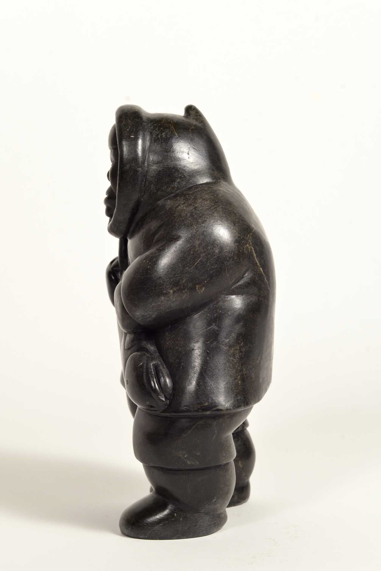 Artwork by Conlucy Nayoumealook, Pècheur avec sa prise, Made of Stone