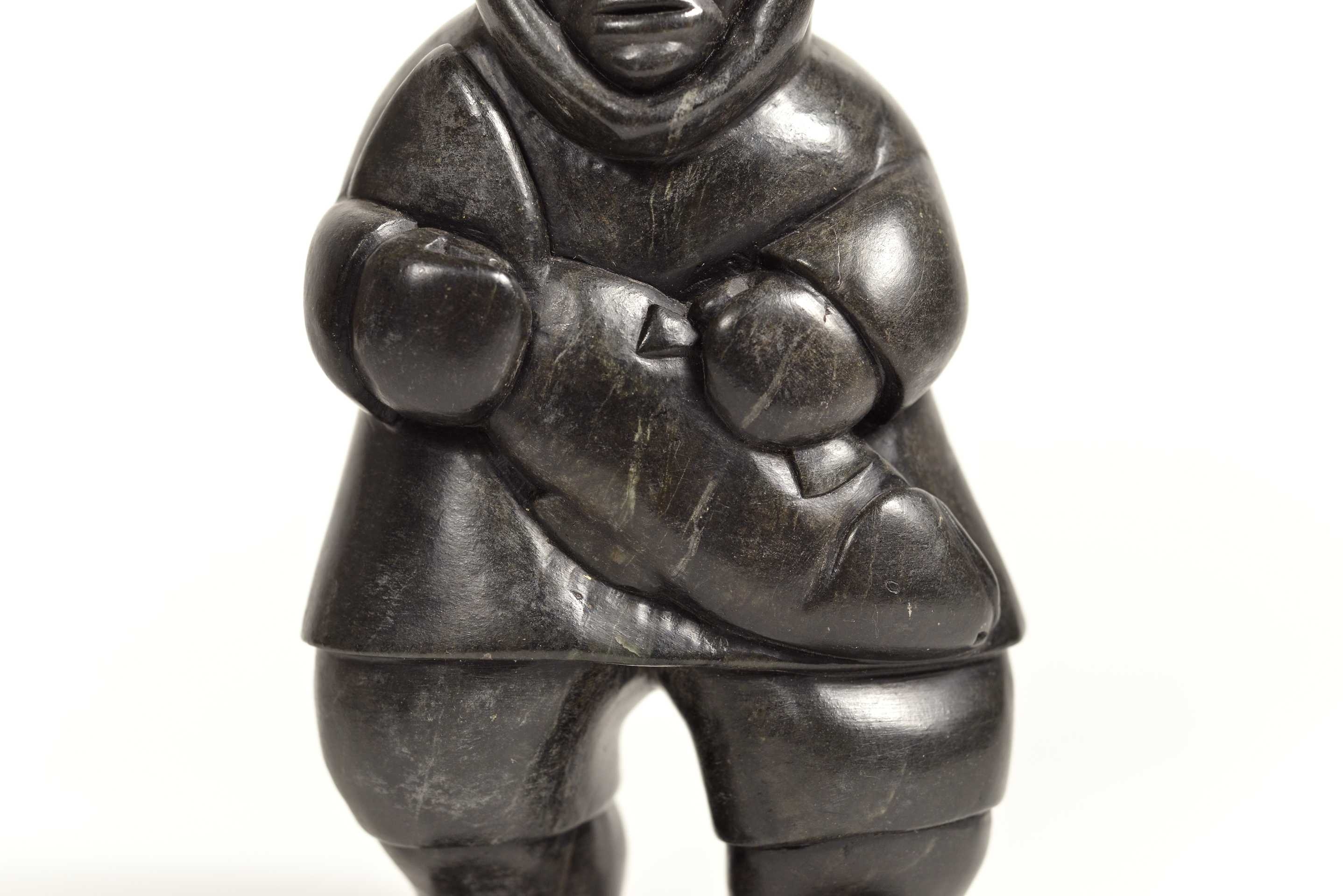 Artwork by Conlucy Nayoumealook, Pècheur avec sa prise, Made of Stone