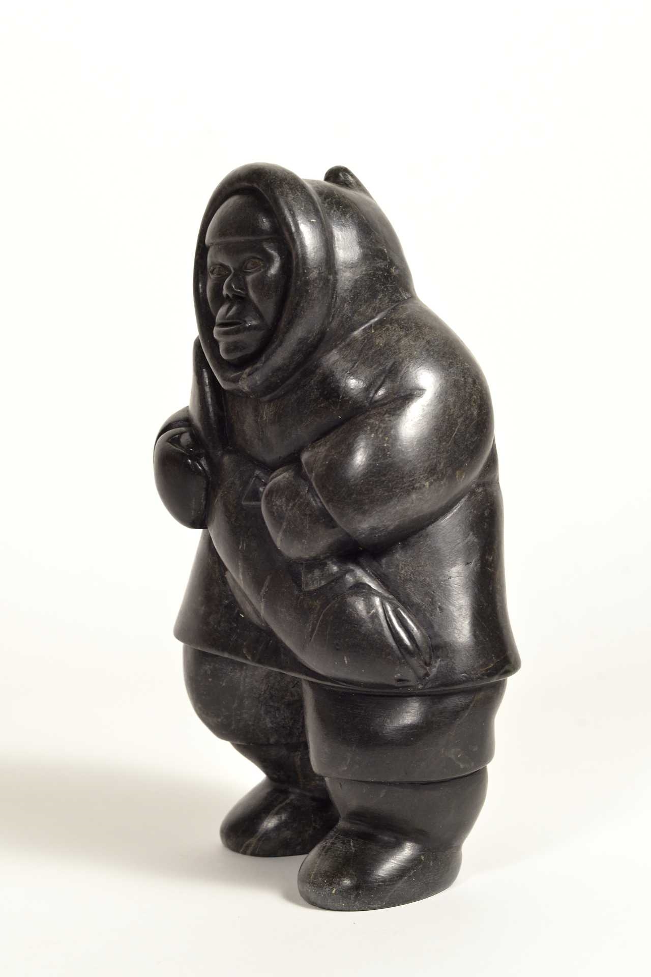 Artwork by Conlucy Nayoumealook, Pècheur avec sa prise, Made of Stone