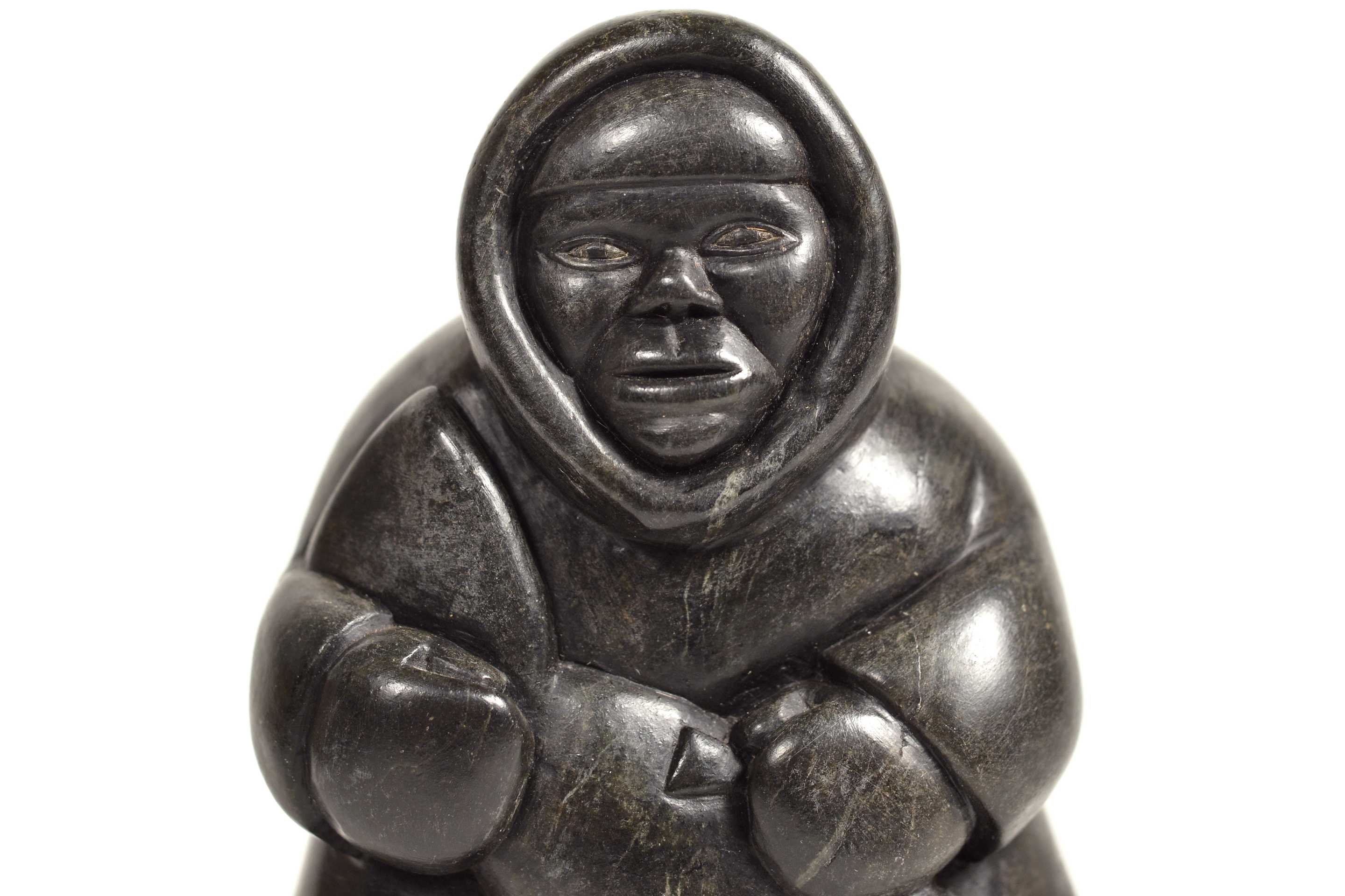 Artwork by Conlucy Nayoumealook, Pècheur avec sa prise, Made of Stone