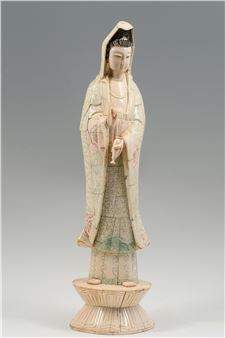Bone clad Quan Yin holding a bottle that holds the water of life in one hand - Yin Quan