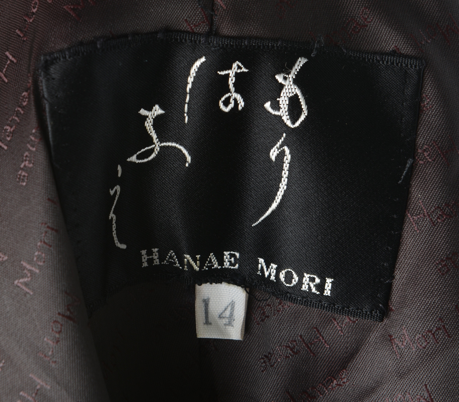 Artwork by Hanae Mori, floral design on black, Made of black, white & yellow