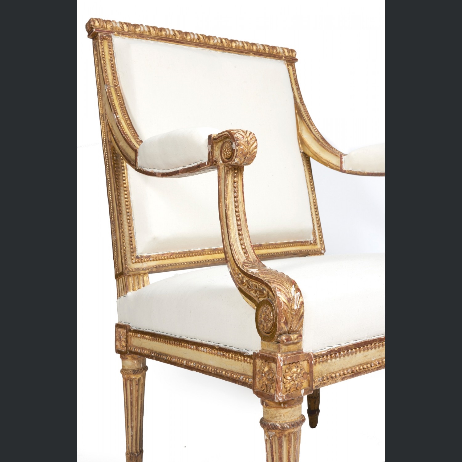 Artwork by Jean-baptiste Lelarge, Paire de fauteuils à dossier légèrement rectangulaire en bois doré mouluré et sculpté de frises de feuilles d'acanthe et de perles