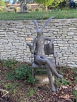 Artwork by Guy du Toit, Lièvre assis sur un fauteuil ("Hare on a Chair")., Made of Bronze