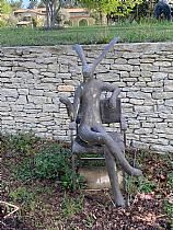 Lièvre assis sur un fauteuil ("Hare on a Chair"). by Guy du Toit, 2018