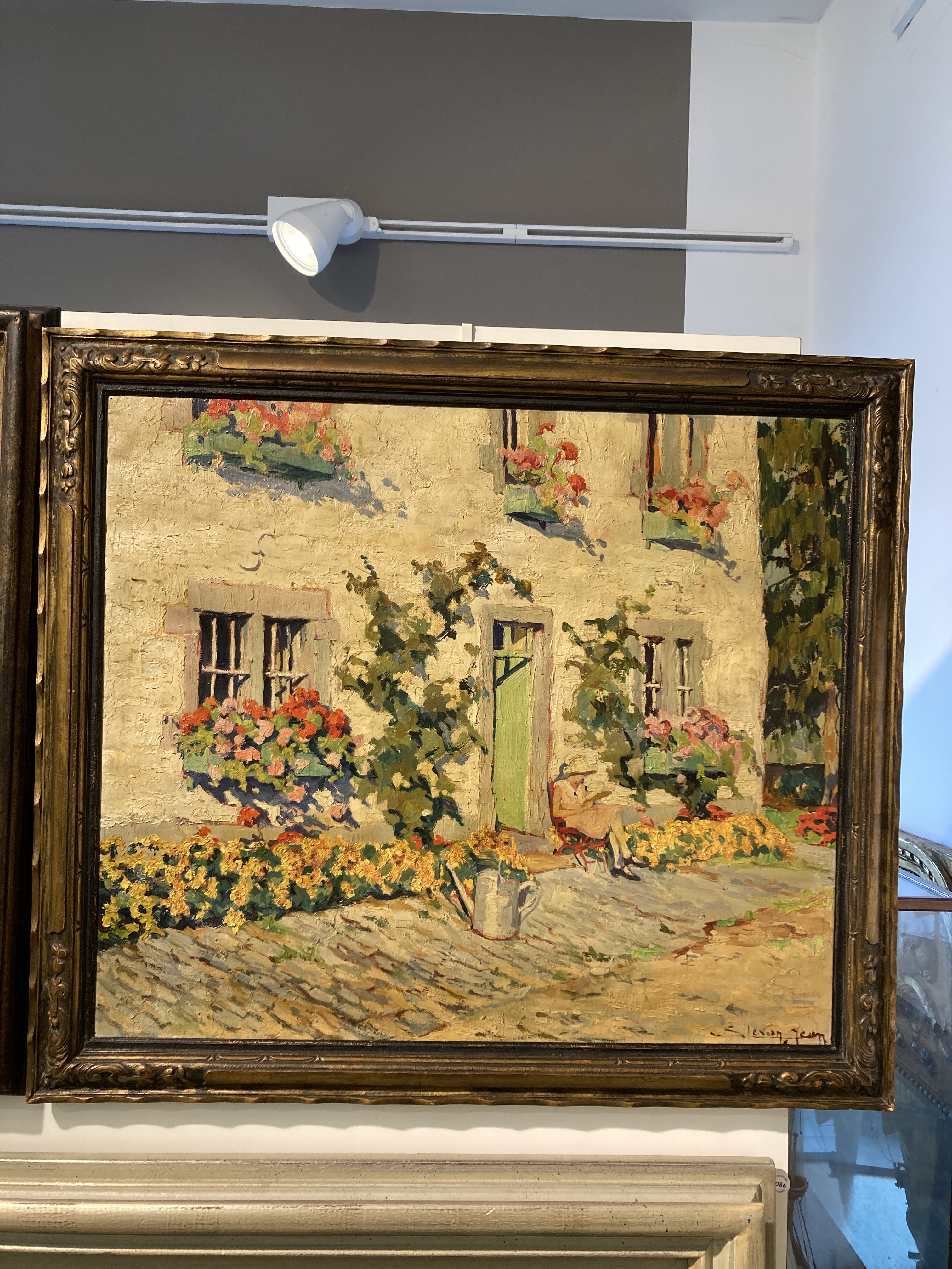 Artwork by Jean Stevan, Girl reading in a sun-drenched garden, Made of oil on canvas