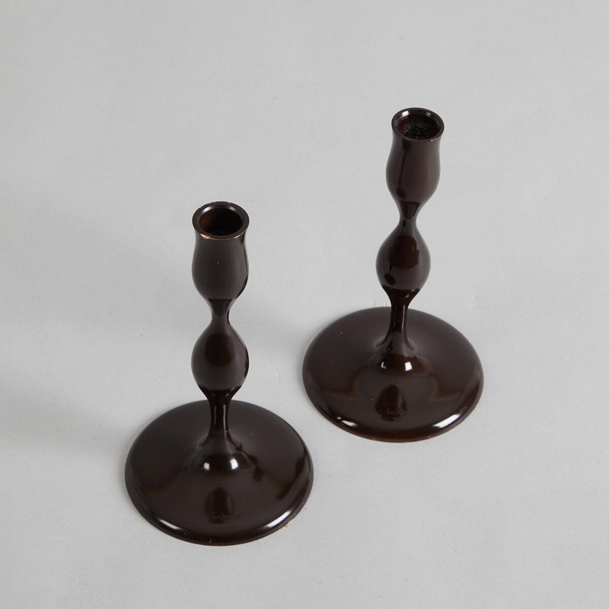 Eva Zeisel These solid brass candlesticks are made using the ancient