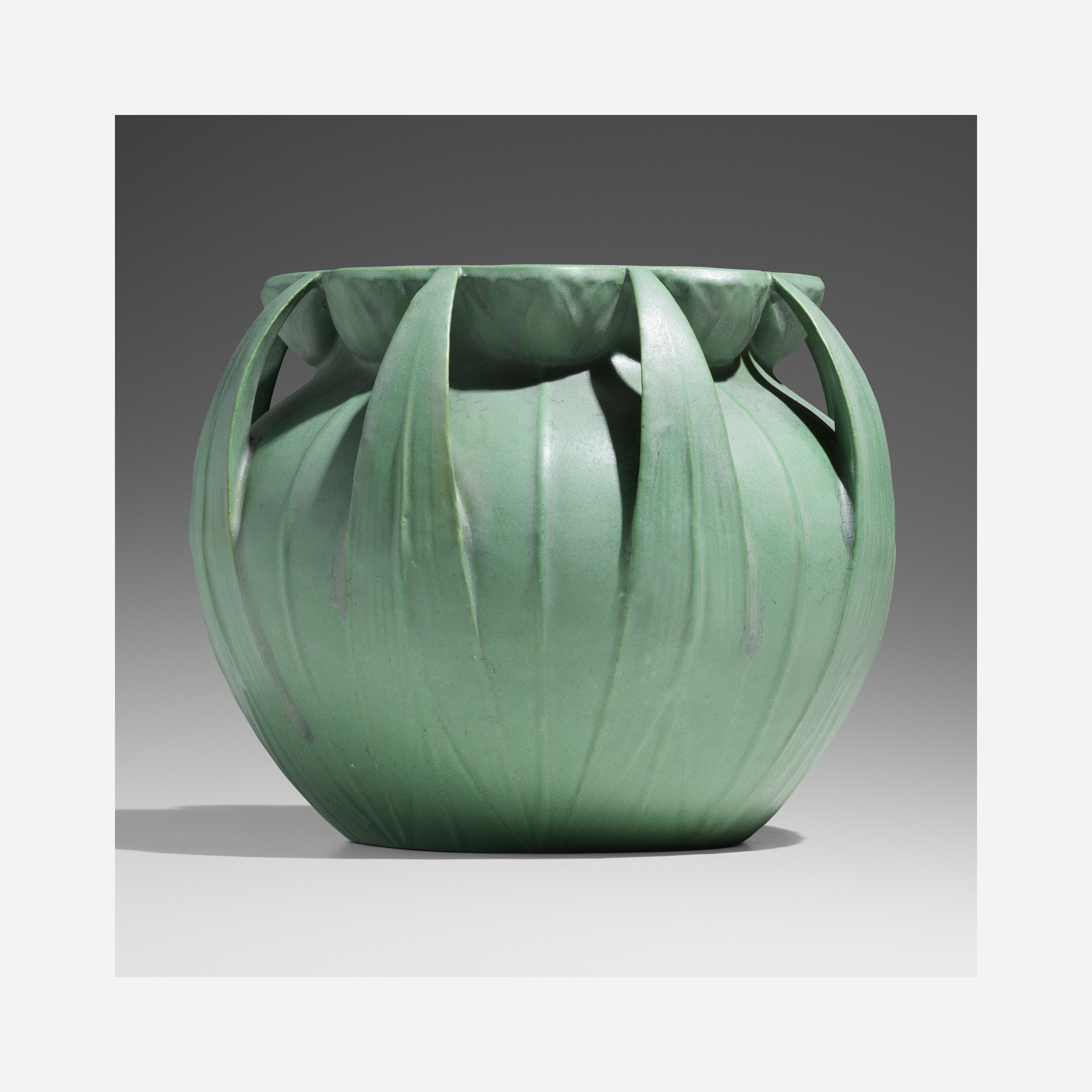 Artwork by Hugh M. G. Garden, Rare jardiniere with lotus blossoms and arrowhead leaves, model 106, Made of glazed earthenware