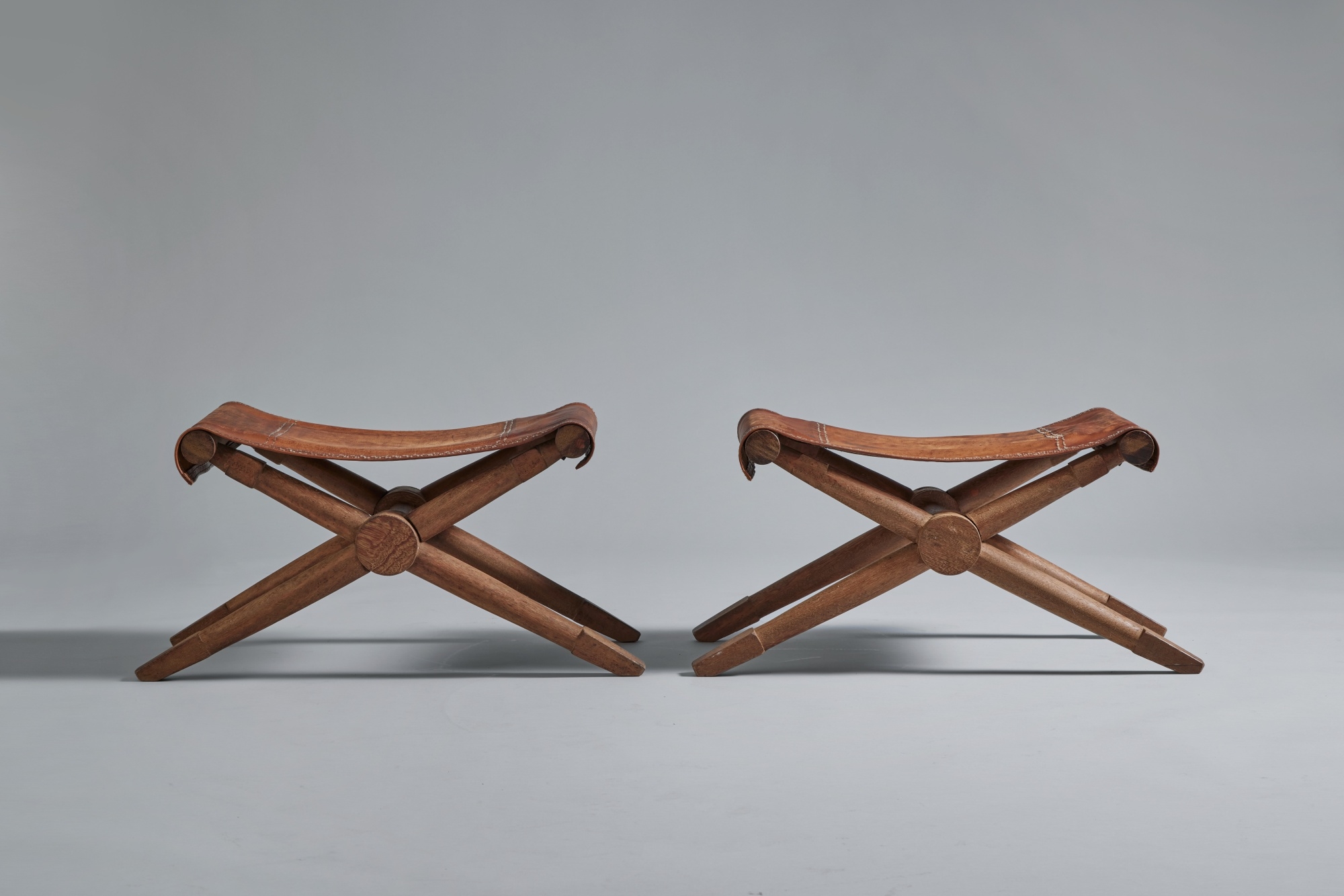 Artwork by Paul Rodocanachi, Pair of "Rodo" Folding Stools, Made of oak, original leather