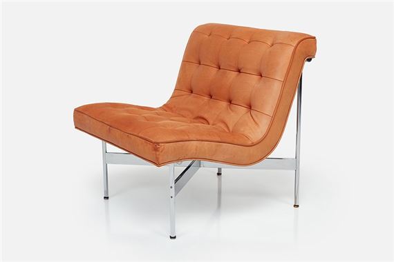 A sleek, tufted chaise lounge with a warm brown leather seat and chrome frame.