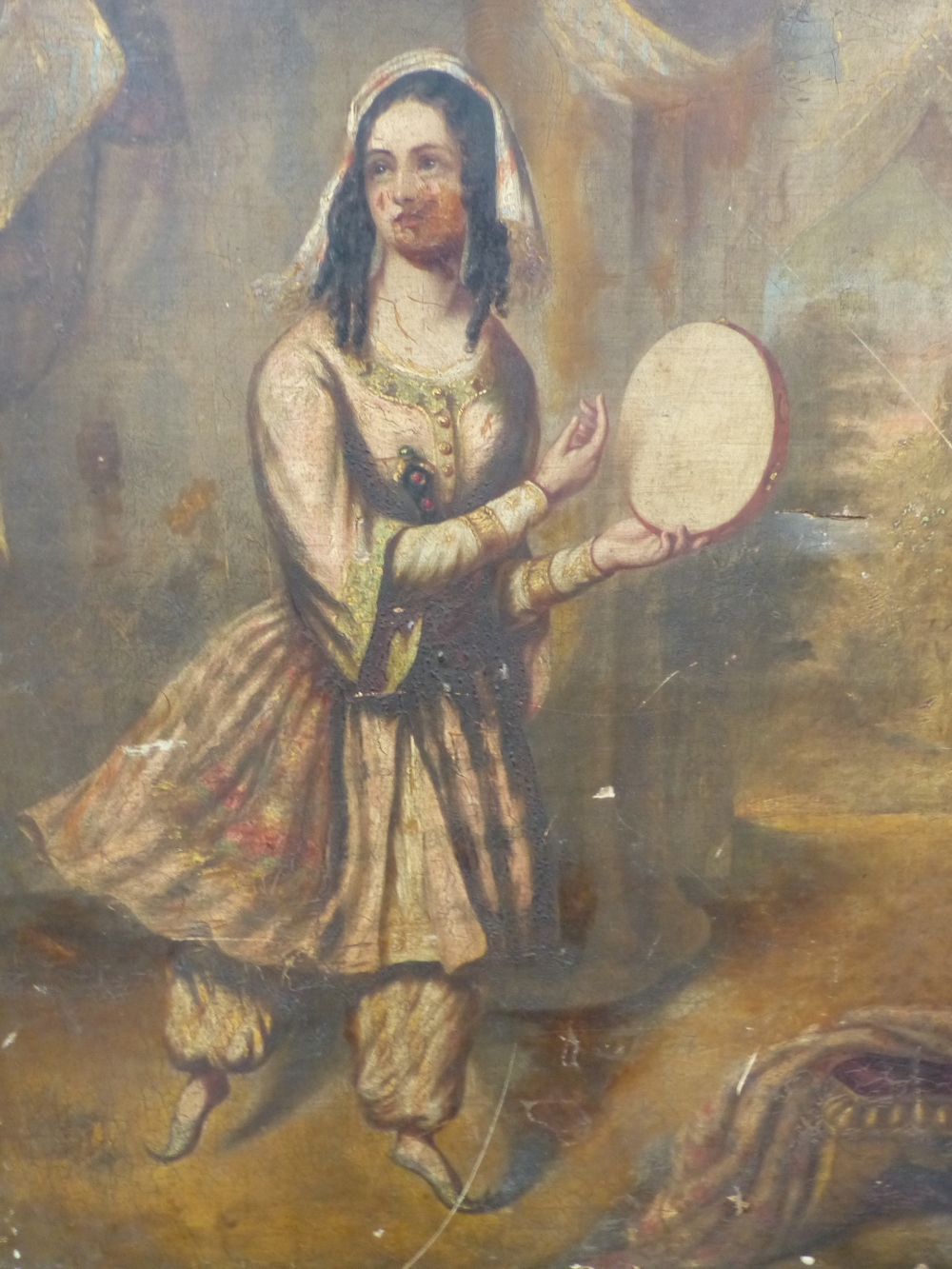19TH CENTURY ORIENTALIST SCHOOL. PORTRAIT OF AN EASTERN YOUNG LADY HOLDING A TAMBOURINE. OIL ON CANVAS. 76 X 64CM by Orientalist School, 19TH CENTURY