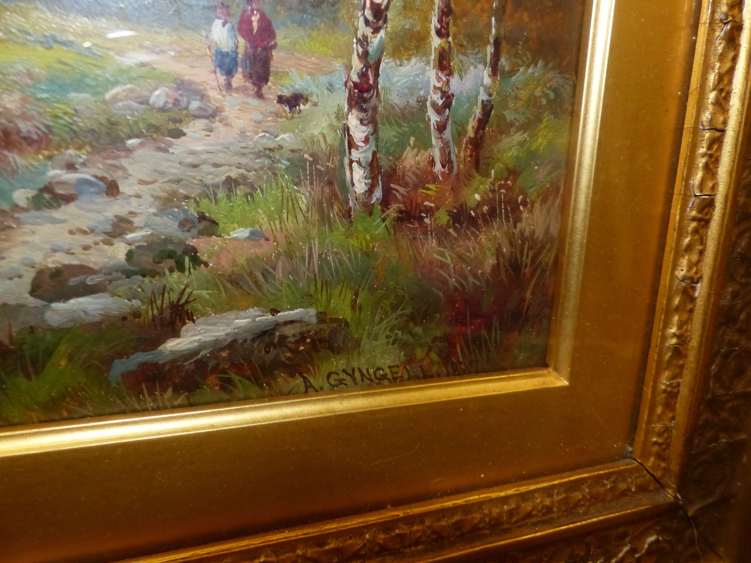 A framed landscape painting of birch trees in a field under an overcast sky.