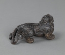 Artwork by Chinese School, A SMALL BRONZE LION, PROBABLY A PAPER WEIGHT, Made of BRONZE