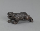 Artwork by Chinese School, A SMALL BRONZE LION, PROBABLY A PAPER WEIGHT, Made of BRONZE