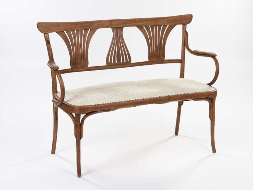 H : 95 cm - W : 130 cm - D : 55 cm Jacob and Josef KOHN Three-seater bentwood bench with openwork backrest and upholstered seats by Jacob & Josef Kohn, Circa 1900