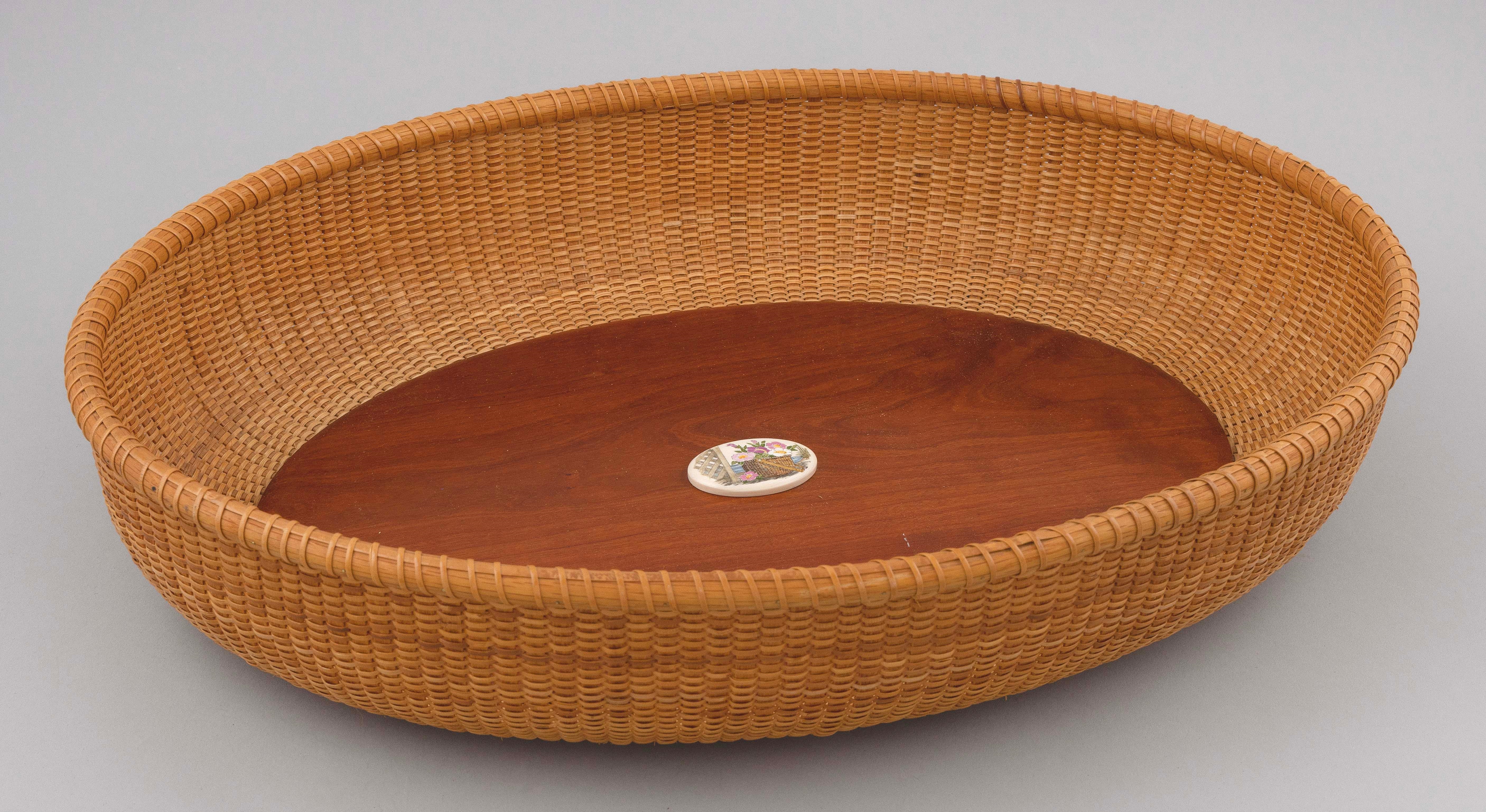 Artwork by L. Reilly, LARGE NANTUCKET BASKET, Made of oval  Oval polychrome